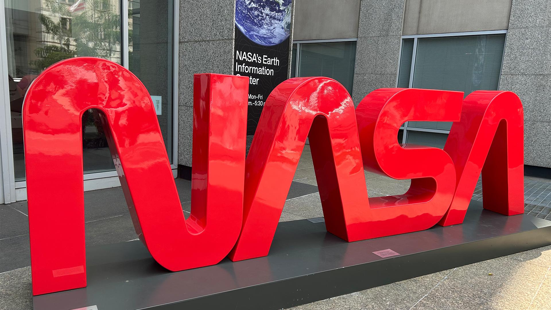 The Earth Information Center exhibit at NASA Headquarters featuring the NASA worm logo.